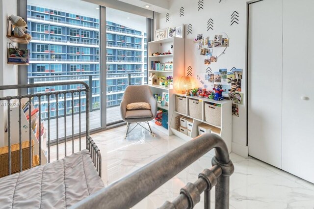 1300 S Miami Ave Unit 2006, Miami, FL 33130 - bedroom featuring a wall of windows, marble tiled flooring, and access to exterior
