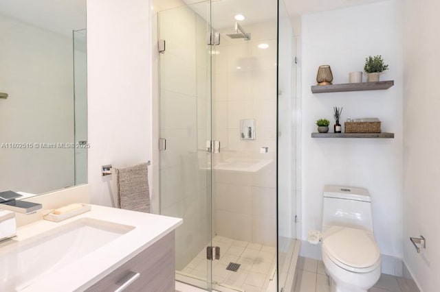 1300 S Miami Ave Unit 2006, Miami, FL 33130 - full bathroom featuring toilet, a stall shower, vanity, and tile patterned flooring