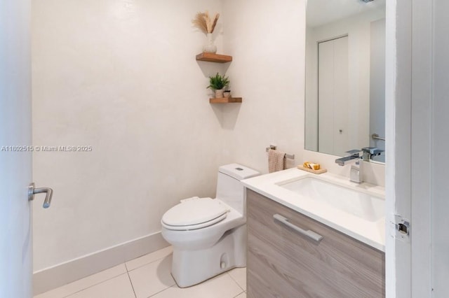 1300 S Miami Ave Unit 2006, Miami, FL 33130 - bathroom with vanity, tile patterned floors, toilet, and baseboards