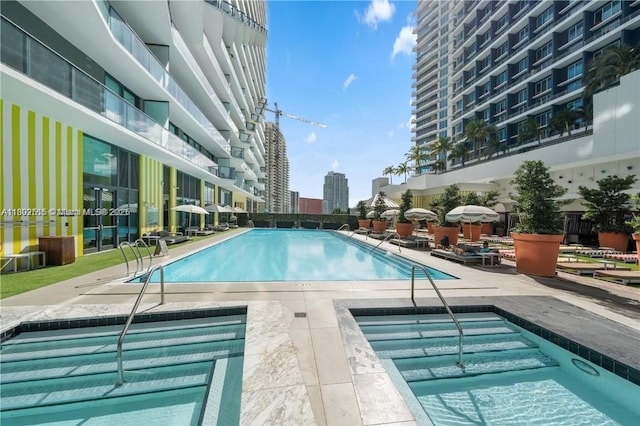 1300 S Miami Ave Unit 2006, Miami, FL 33130 - community pool featuring a patio