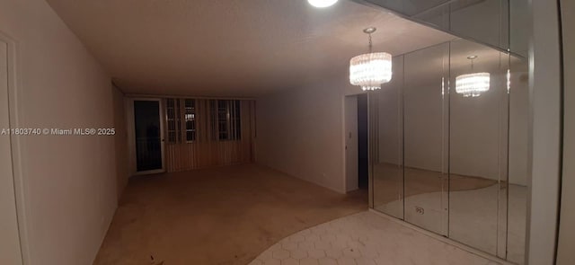251 174th St Unit 1711, Sunny Isles Beach, FL 33160 - hall featuring carpet floors and a chandelier