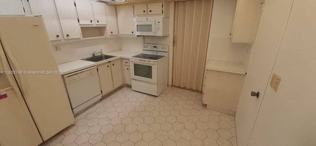 251 174th St Unit 1711, Sunny Isles Beach, FL 33160 - kitchen with white appliances, a sink, light countertops, open shelves, and cream cabinetry