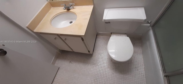 251 174th St Unit 1711, Sunny Isles Beach, FL 33160 - full bath featuring a shower with shower door, vanity, toilet, and tile patterned floors