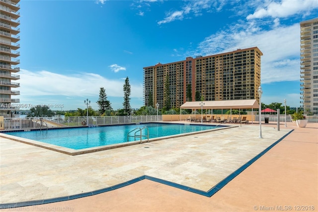 251 174th St Unit 1711, Sunny Isles Beach, FL 33160 - community pool featuring fence and a patio