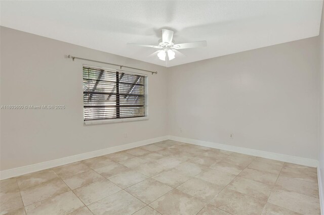 7915 SW 86th St Unit 705, Miami, FL 33143 - empty room featuring a ceiling fan, baseboards, and light tile patterned flooring