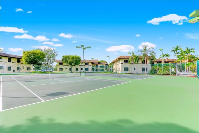 7915 SW 86th St Unit 705, Miami, FL 33143 - view of tennis court with community basketball court and a residential view