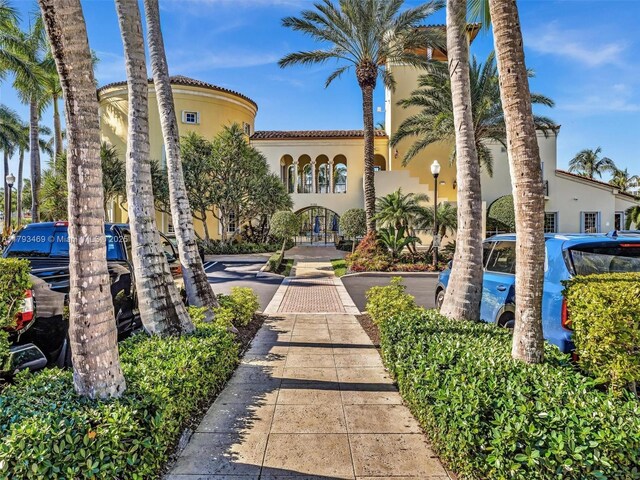 3144 NE 212th St, Aventura, FL 33180 - view of front of property with stucco siding and a tile roof