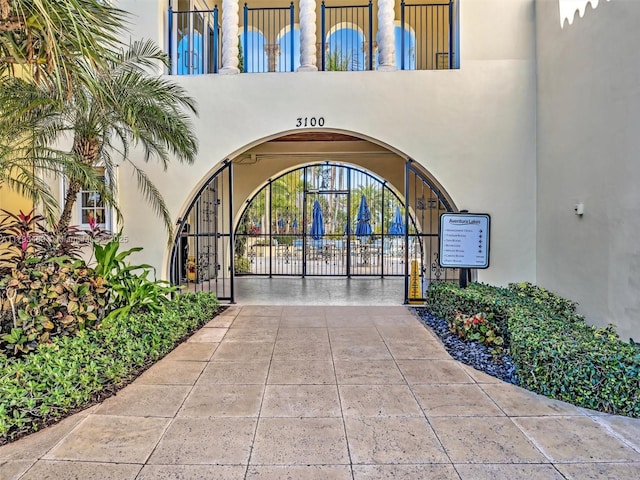 3144 NE 212th St, Aventura, FL 33180 - property entrance featuring stucco siding and a gate