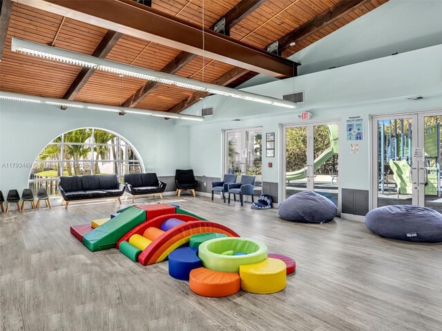 3144 NE 212th St, Aventura, FL 33180 - rec room with french doors, a wooden ceiling with exposed beams, wood finished floors, plenty of natural light, and high vaulted ceiling