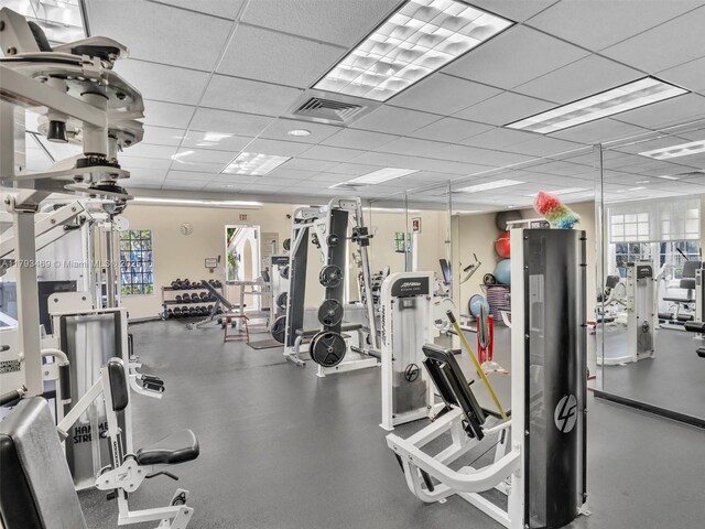 3144 NE 212th St, Aventura, FL 33180 - workout area with healthy amount of natural light and a drop ceiling