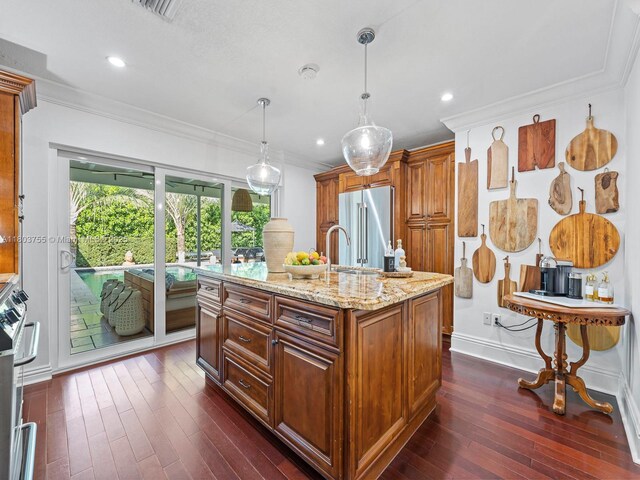 7945 SW 98th Ter, Miami, FL 33156 - kitchen with high end fridge, dark wood finished floors, light stone counters, crown molding, and a sink