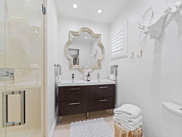 7945 SW 98th Ter, Miami, FL 33156 - full bath with a shower stall, toilet, tile patterned floors, double vanity, and recessed lighting