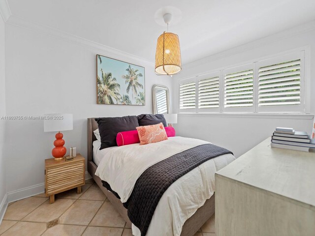 7945 SW 98th Ter, Miami, FL 33156 - bedroom with light tile patterned flooring, crown molding, and baseboards