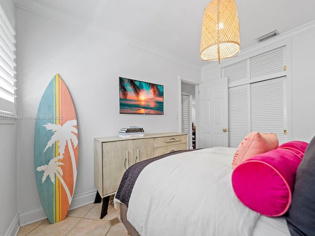 7945 SW 98th Ter, Miami, FL 33156 - bedroom featuring crown molding, light tile patterned floors, and baseboards