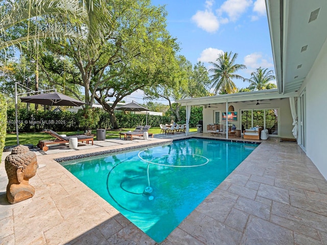 7945 SW 98th Ter, Miami, FL 33156 - view of swimming pool featuring a ceiling fan, a patio area, outdoor dining area, and an outdoor living space