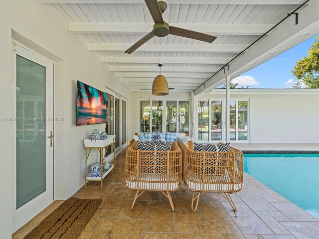 7945 SW 98th Ter, Miami, FL 33156 - sunroom / solarium featuring stone tile flooring, beamed ceiling, and wooden ceiling