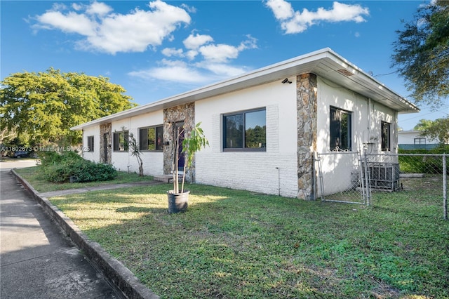 2 NW 47th St, Miami, FL 33127 - view of front of property with stone siding