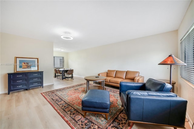 2 NW 47th St, Miami, FL 33127 - living area with light wood-type flooring and baseboards