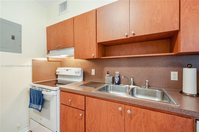 2 NW 47th St, Miami, FL 33127 - kitchen featuring electric range, open shelves, electric panel, backsplash, and under cabinet range hood
