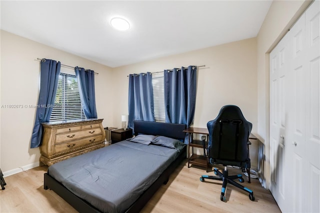 2 NW 47th St, Miami, FL 33127 - bedroom with light wood-style floors and baseboards