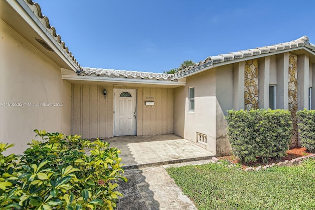 10950 NW 38th Ct, Coral Springs, FL 33065 - empty room with a ceiling fan, light tile patterned floors, and baseboards