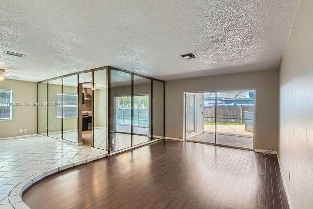 10950 NW 38th Ct, Coral Springs, FL 33065 - bathroom featuring toilet, tile patterned flooring, and two vanities