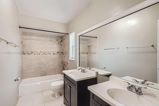 10950 NW 38th Ct, Coral Springs, FL 33065 - full bath with toilet, tile patterned flooring, shower / tub combination, and two vanities
