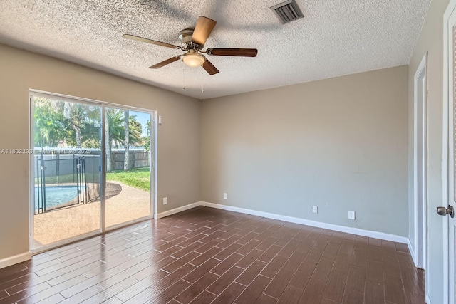 10950 NW 38th Ct, Coral Springs, FL 33065 - unfurnished room featuring ceiling fan, baseboards, a textured ceiling, and dark wood-style flooring