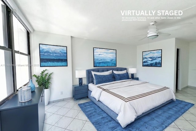 1000 Parkview Dr Unit 424, Hallandale Beach, FL 33009 - bedroom with light tile patterned floors and a ceiling fan