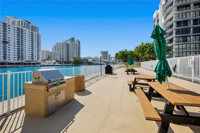 1000 Parkview Dr Unit 424, Hallandale Beach, FL 33009 - view of pool with grilling area, a view of city, a patio area, and a water view