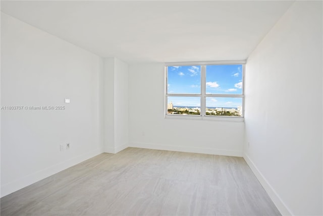 650 W Ave Unit 1404, Miami Beach, FL 33139 - empty room featuring baseboards