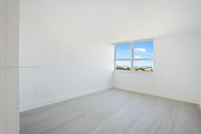 650 W Ave Unit 1404, Miami Beach, FL 33139 - spare room with baseboards