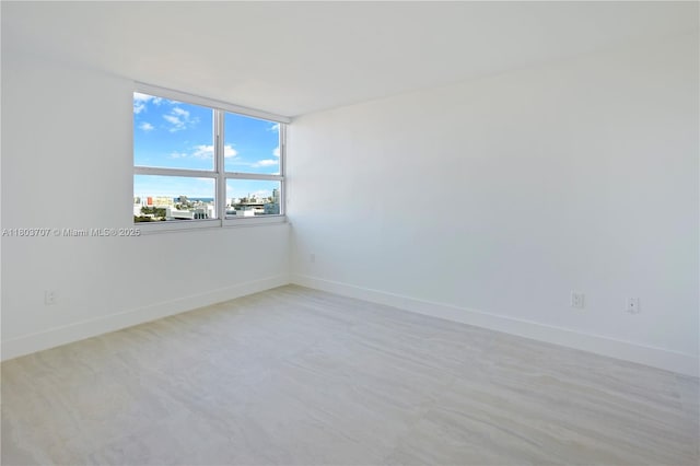 650 W Ave Unit 1404, Miami Beach, FL 33139 - unfurnished room with baseboards