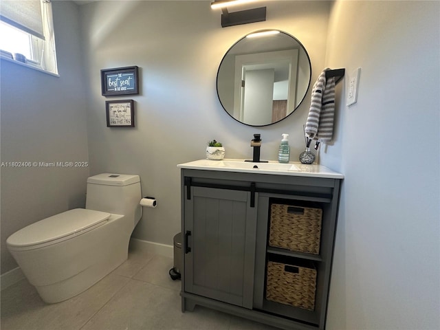 8443 SW 137th Ave Unit 8443, Miami, FL 33183 - bathroom featuring toilet, vanity, tile patterned floors, and baseboards