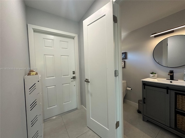 8443 SW 137th Ave Unit 8443, Miami, FL 33183 - bathroom with vanity, toilet, tile patterned flooring, and baseboards