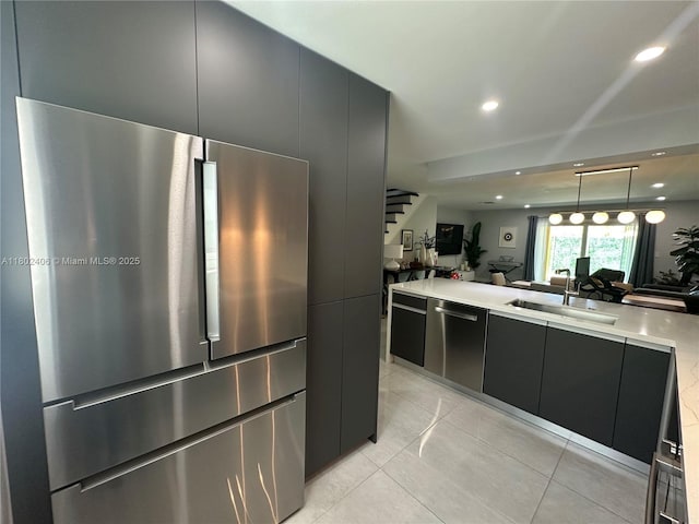 8443 SW 137th Ave Unit 8443, Miami, FL 33183 - kitchen featuring appliances with stainless steel finishes, a sink, open floor plan, modern cabinets, and recessed lighting