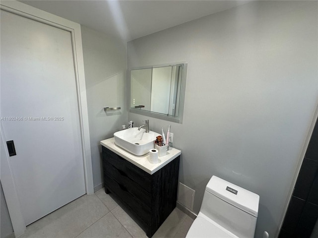 8443 SW 137th Ave Unit 8443, Miami, FL 33183 - bathroom with vanity, tile patterned flooring, and toilet