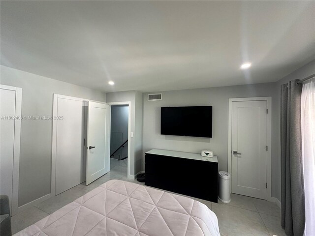 8443 SW 137th Ave Unit 8443, Miami, FL 33183 - bedroom with light tile patterned floors, baseboards, and recessed lighting
