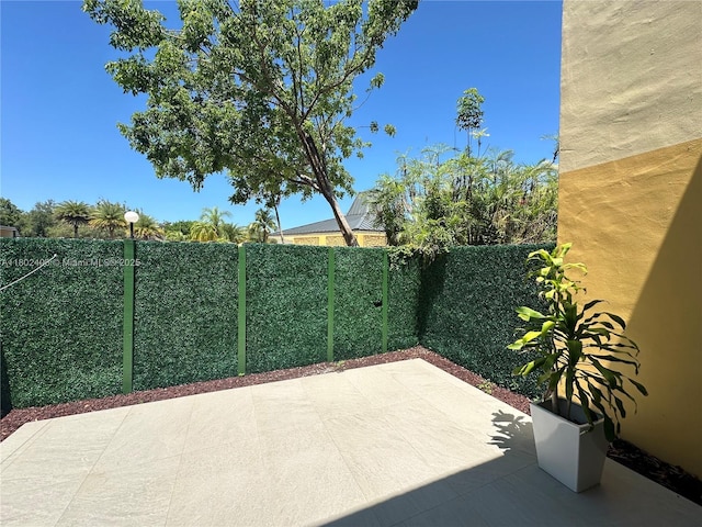 8443 SW 137th Ave Unit 8443, Miami, FL 33183 - fenced backyard with a patio area
