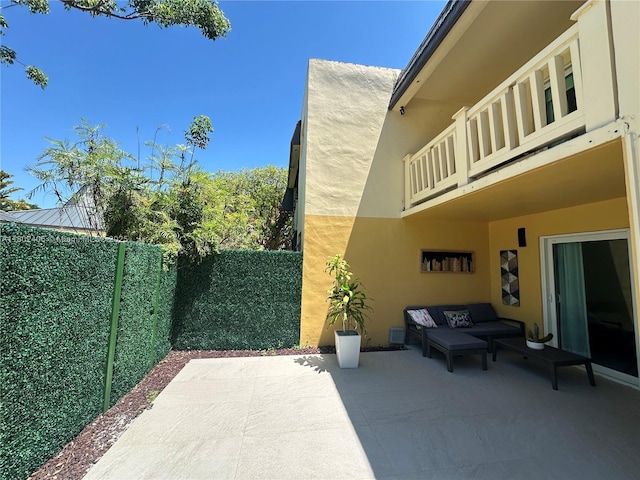 8443 SW 137th Ave Unit 8443, Miami, FL 33183 - fenced backyard featuring a patio area, outdoor lounge area, and a balcony