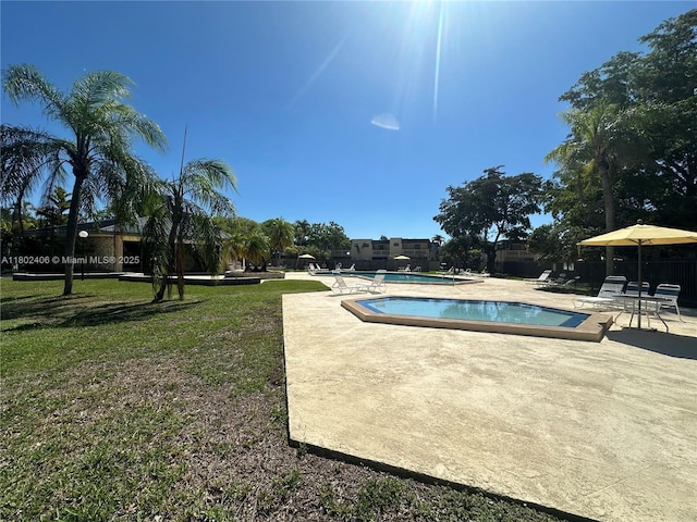 8443 SW 137th Ave Unit 8443, Miami, FL 33183 - community pool with a patio and a yard