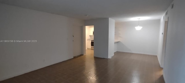 unfurnished room featuring wood finished floors