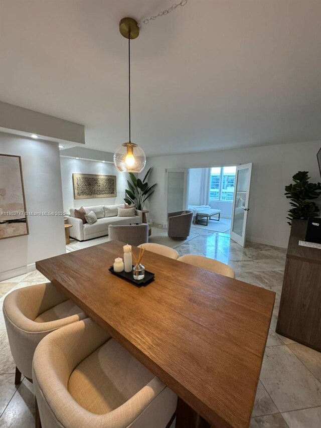 2301 Collins Ave Unit 731, Miami Beach, FL 33139 - dining space with baseboards