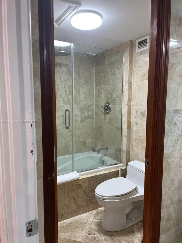 2301 Collins Ave Unit 731, Miami Beach, FL 33139 - full bath featuring toilet and tiled shower / bath combo