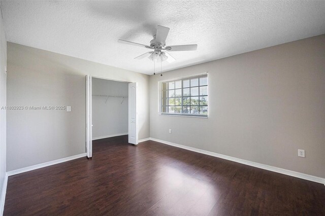 16421 SW 103rd Ter, Miami, FL 33196 - unfurnished bedroom featuring wood finished floors, a closet, baseboards, a textured ceiling, and ceiling fan