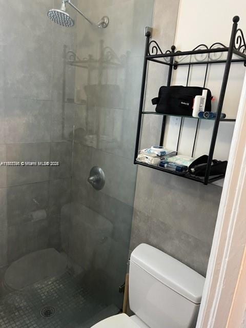 741 15th St Unit 8, Miami Beach, FL 33139 - bathroom featuring toilet and tiled shower
