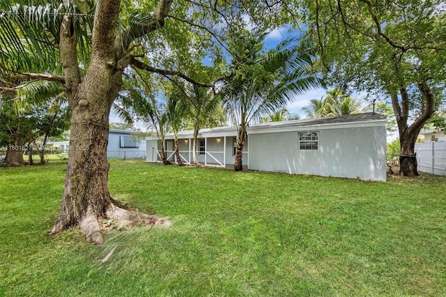19735 NE 12th Ave, Miami, FL 33179 - rear view of property with stucco siding