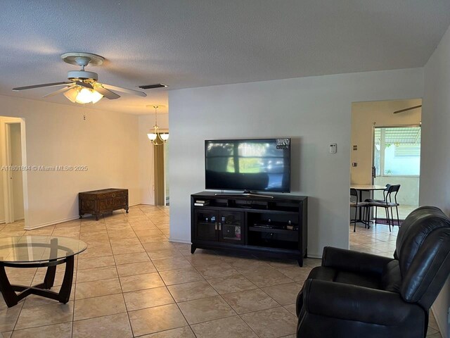 1130 NW 67th Ave, Margate, FL 33063 - tiled living room featuring a ceiling fan