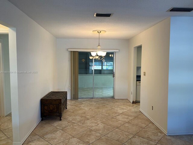 1130 NW 67th Ave, Margate, FL 33063 - unfurnished dining area featuring a chandelier and baseboards