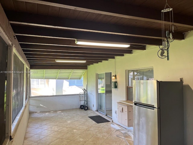 1130 NW 67th Ave, Margate, FL 33063 - unfurnished sunroom with beam ceiling
